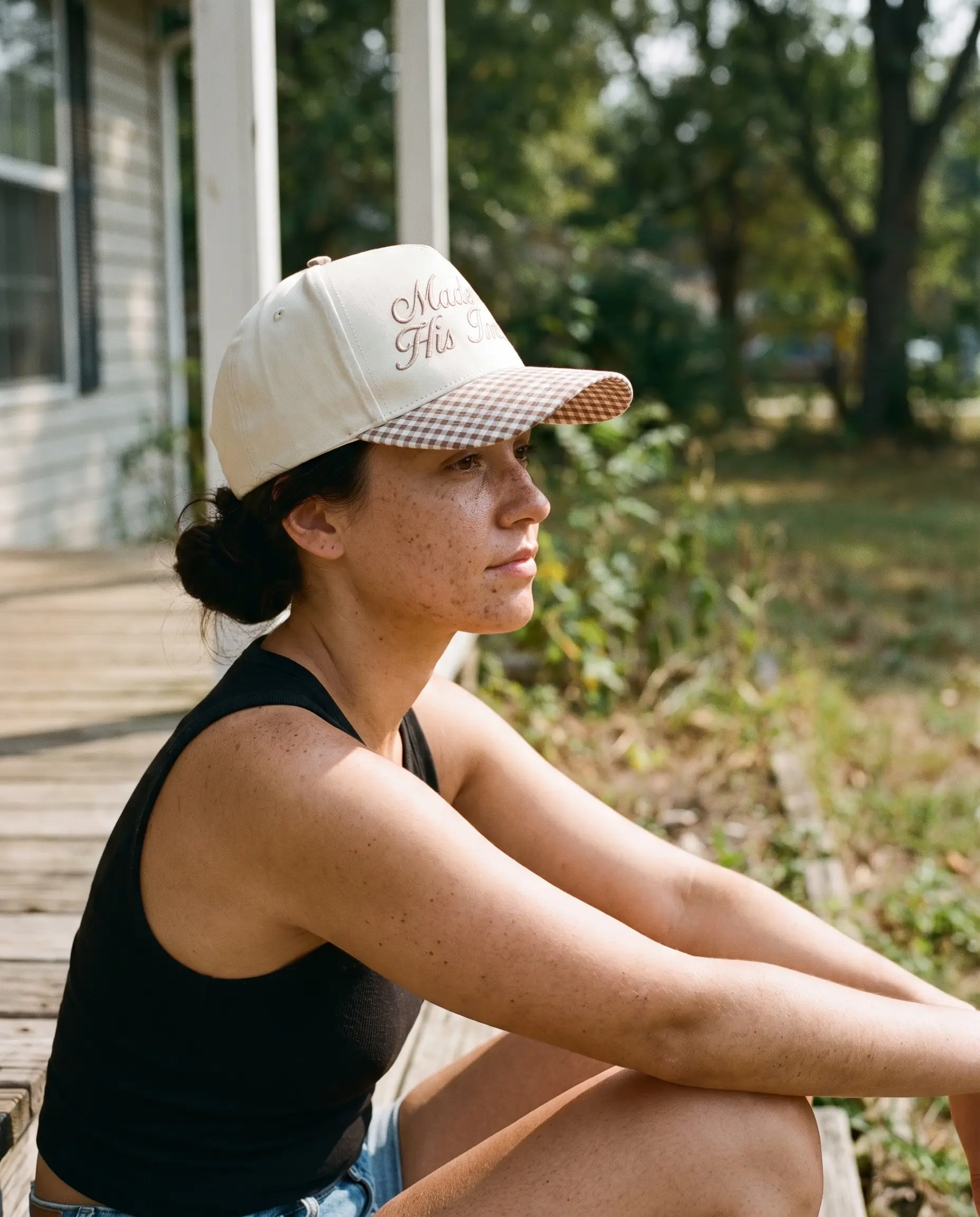 Model wearing the Made In His Image Hat, Brown Gingham, second view