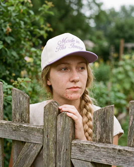Model wearing the Made In His Image Hat, Lilac, second view