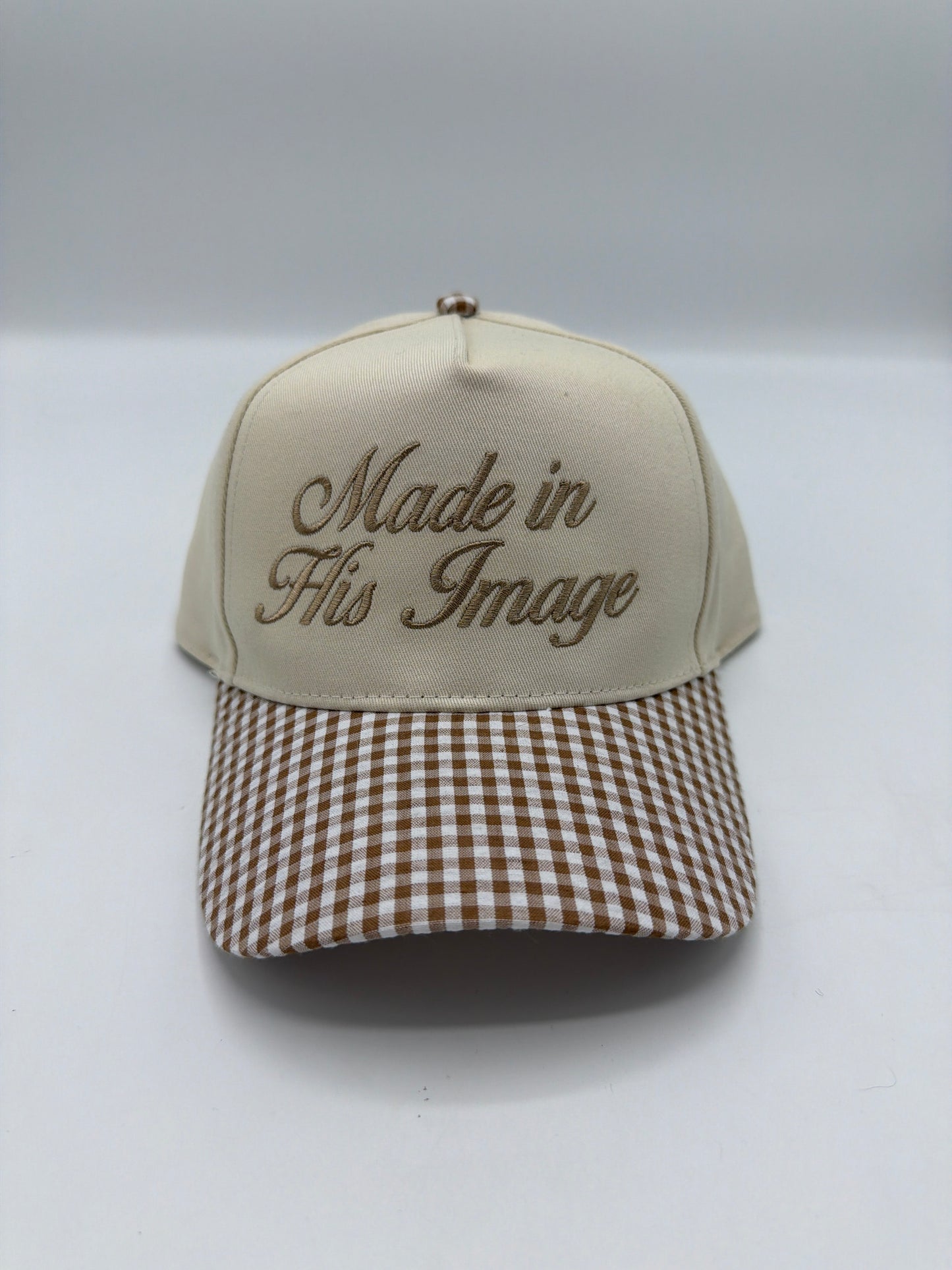 Made In His Image in tan script on a cream crown with a brown gingham brim
