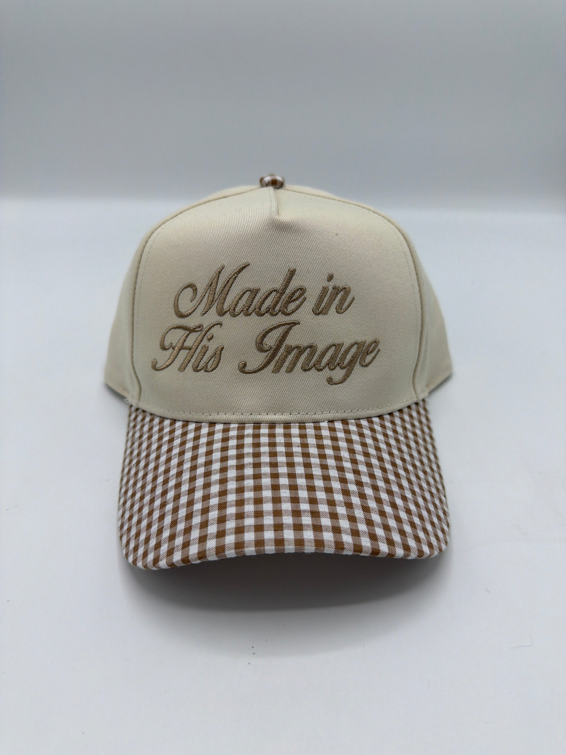 Made In His Image in tan script on a cream crown with a brown gingham brim