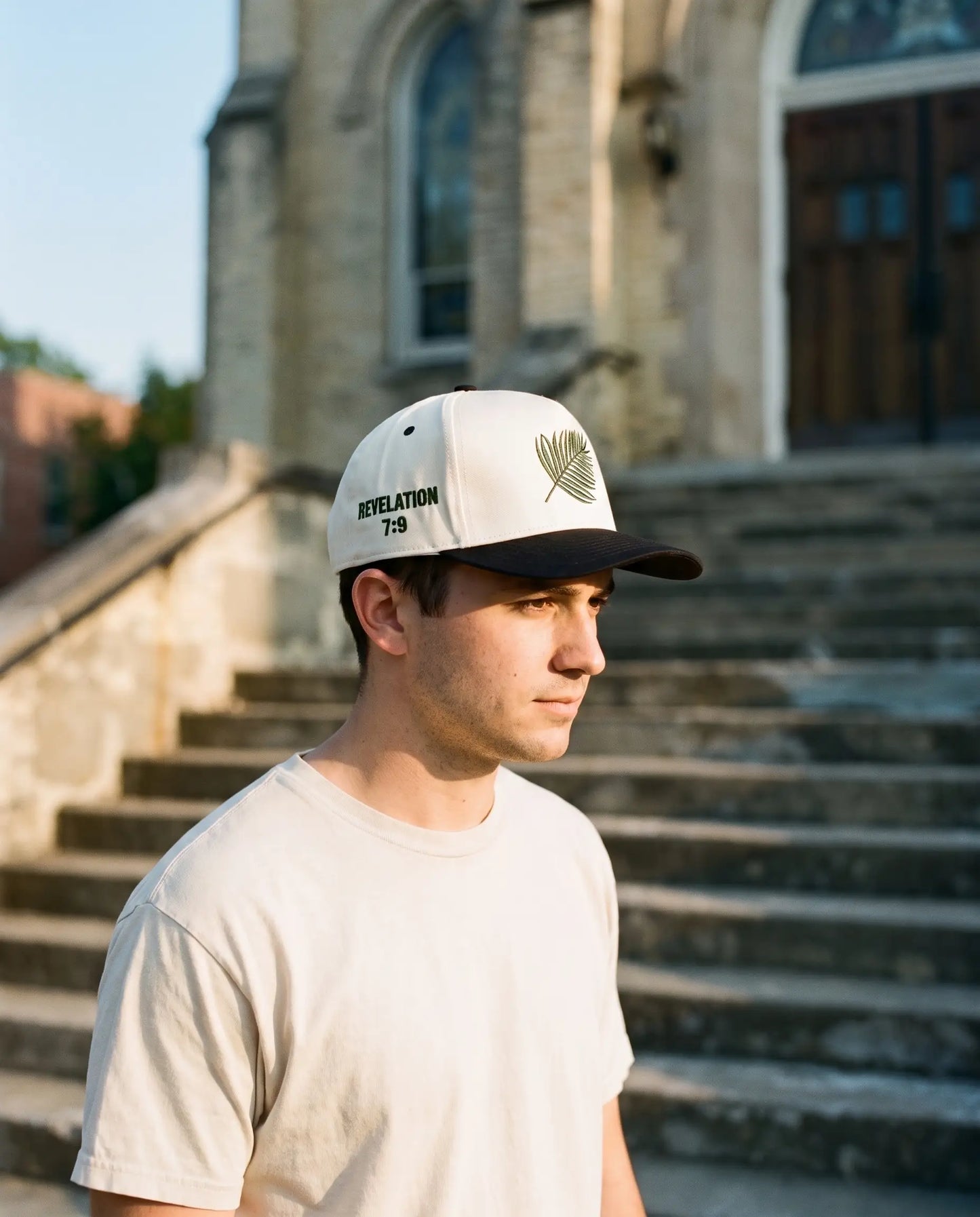 Model wearing the Revelation 7:9 Palm Leaf Hat