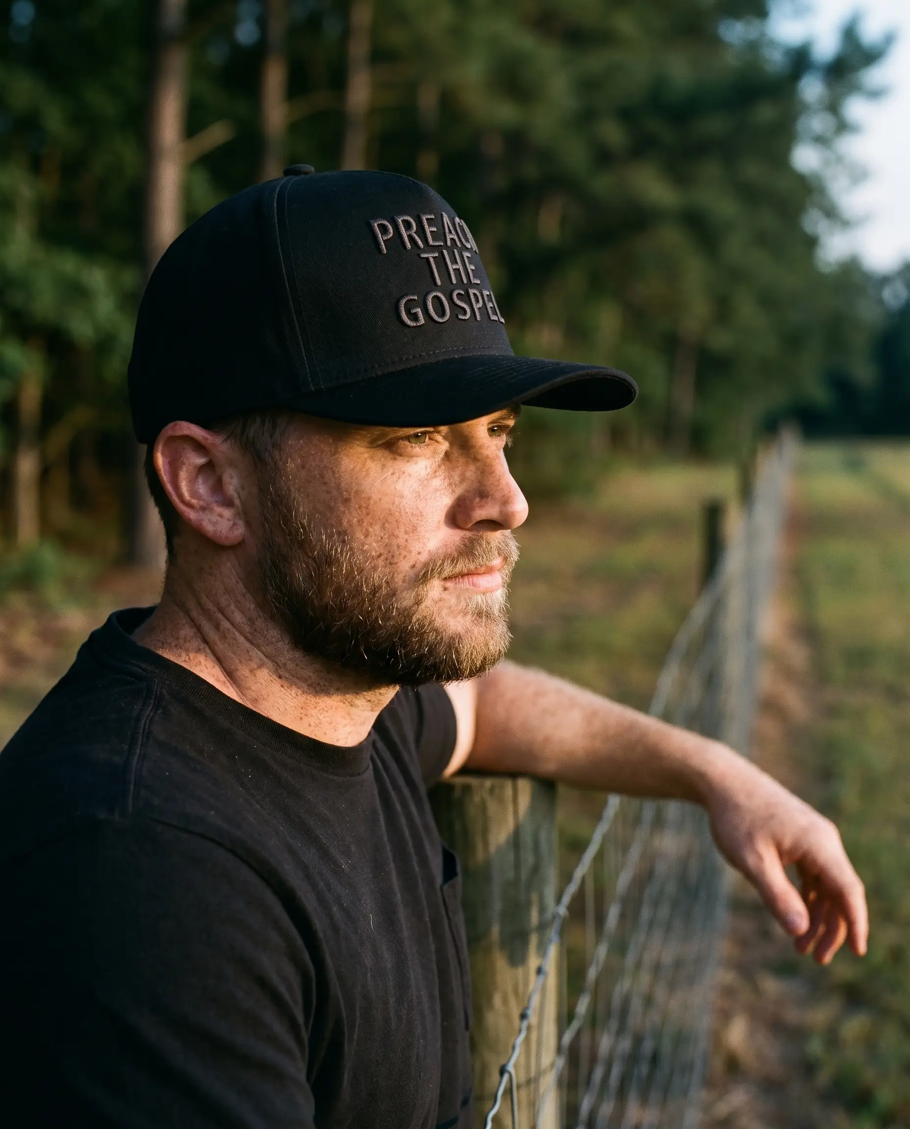 Model wearing the Preach The Gospel Hat, Blackout, second view