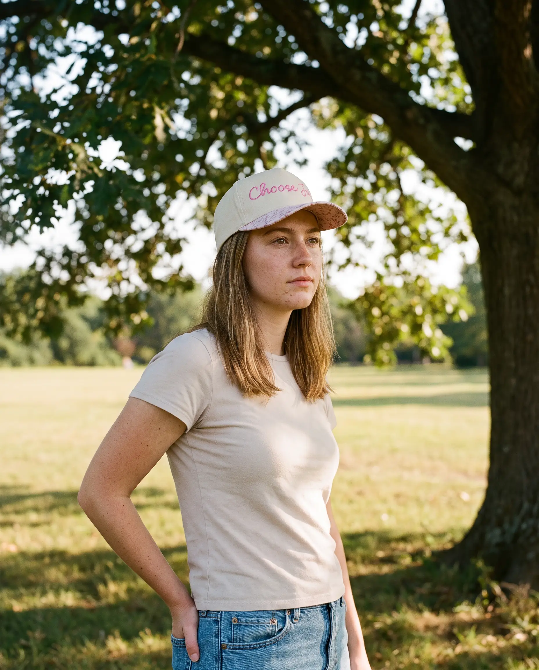 Model wearing the Choose Joy Hat, Floral Brim, second view