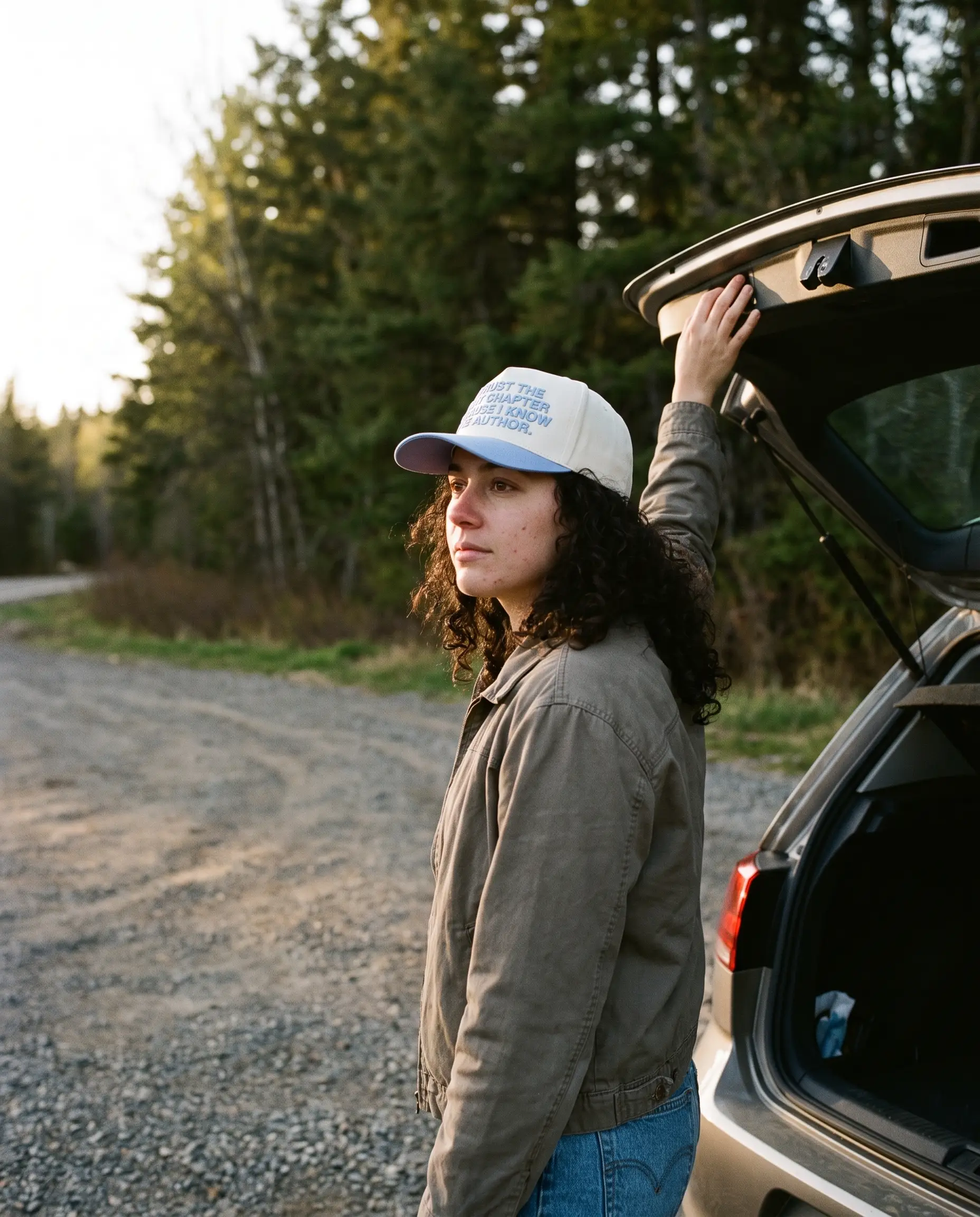 Model wearing the I Know The Author Hat, Periwinkle, second view