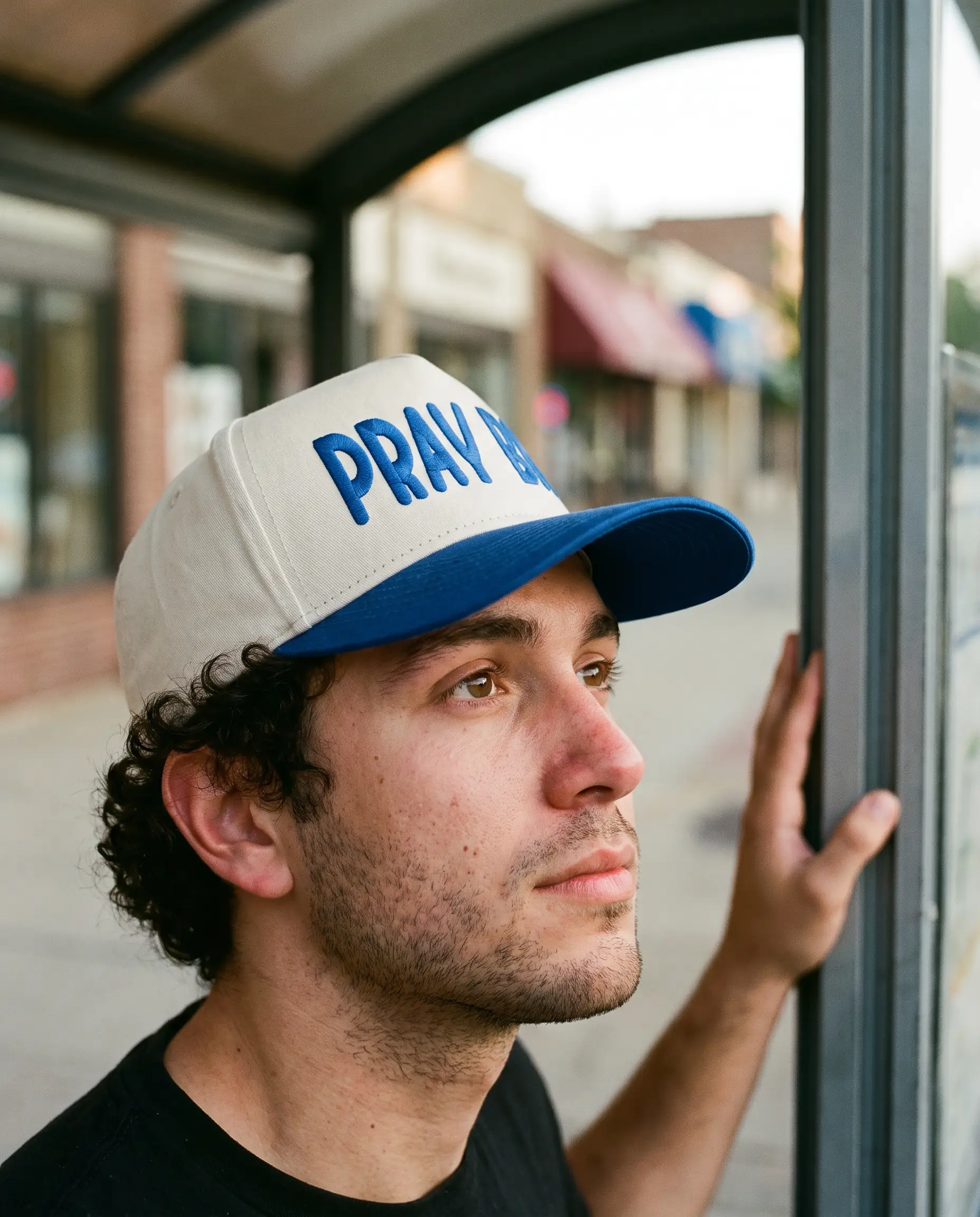 Model wearing the Pray Big Hat, Royal Blue, second view