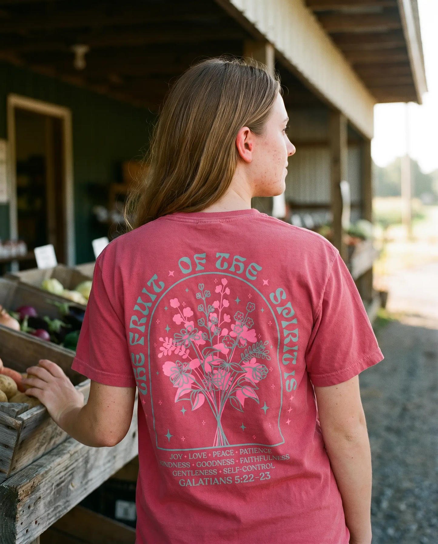 Model wearing the Fruit Of The Spirit Shirt, Crimson