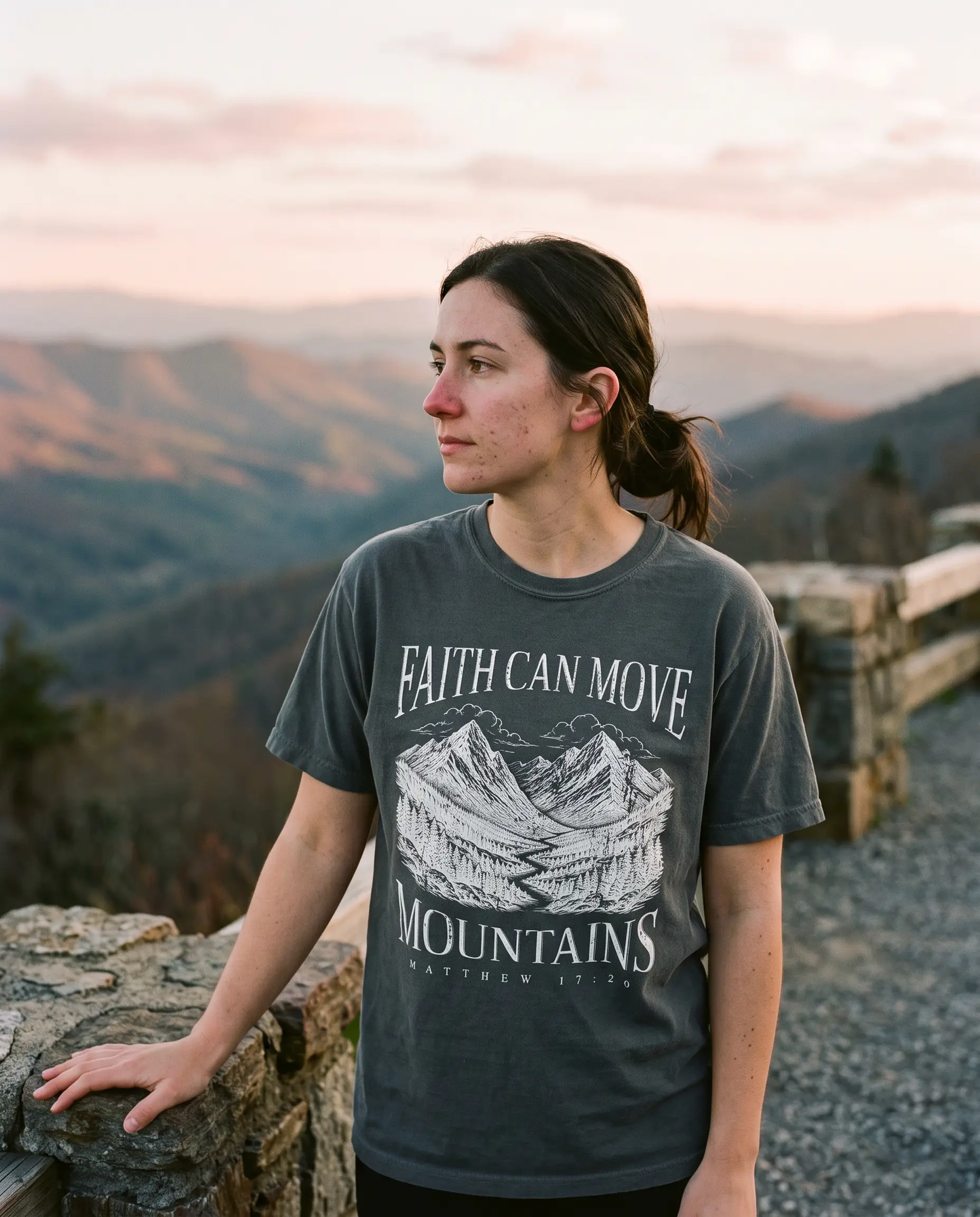 Model wearing the Faith Can Move Mountains Shirt, Pepper