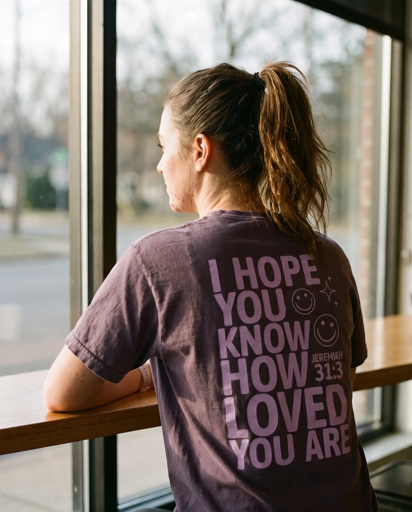 Model wearing the You Are Loved Shirt