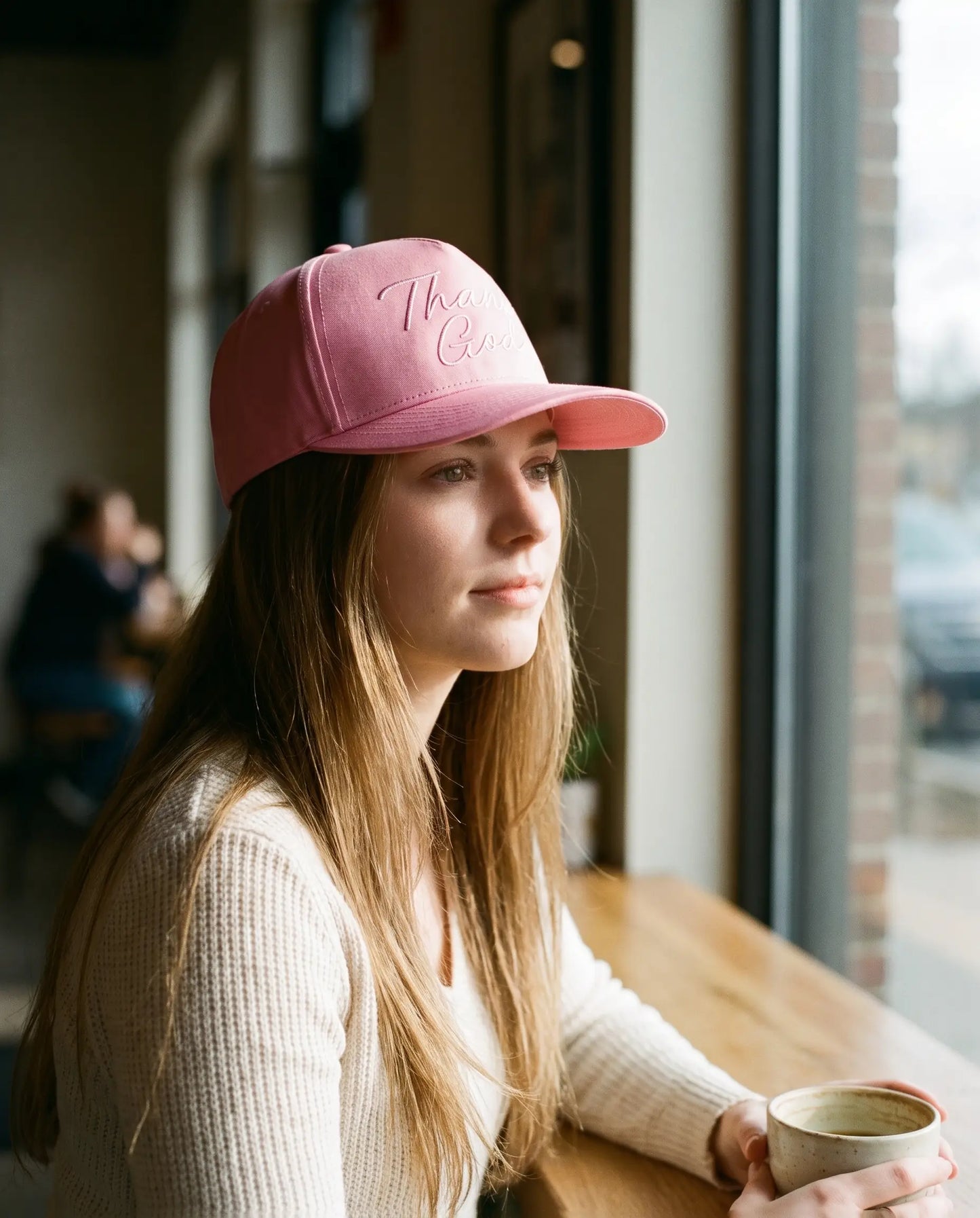 Model wearing the Thank God Script Hat, Pink on Pink