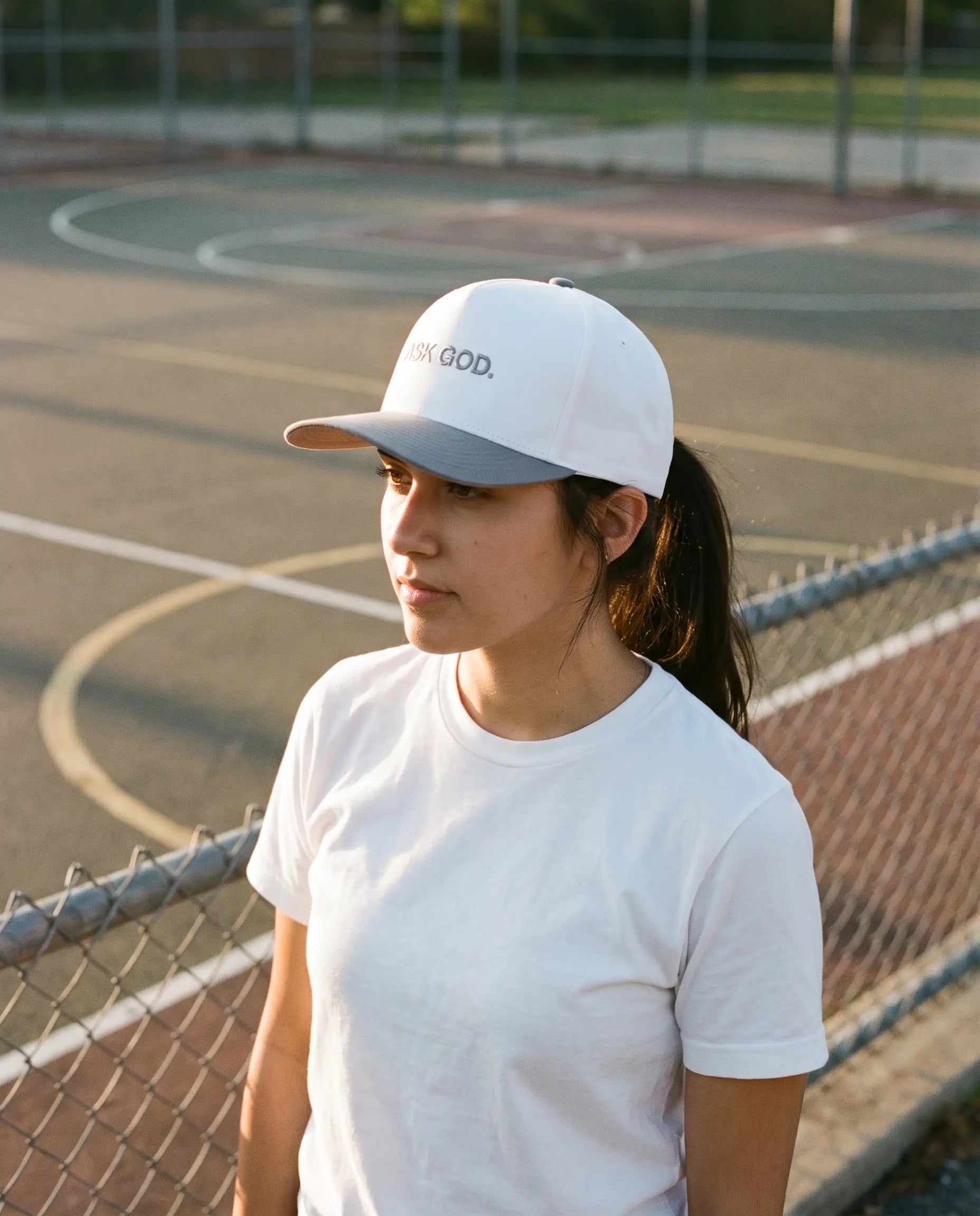 Model wearing the Ask God Hat, White and Grey