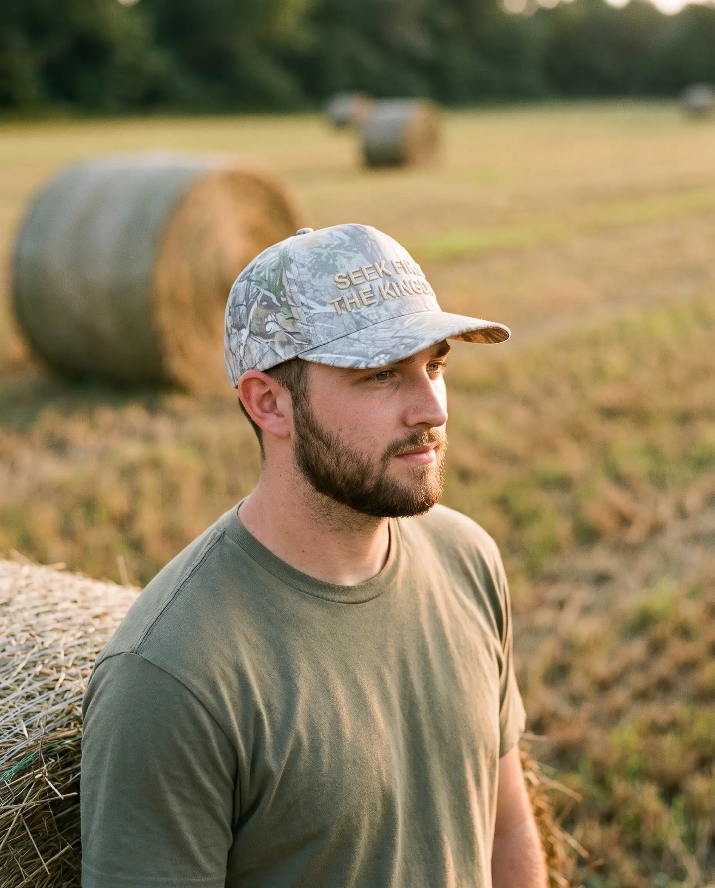 Model wearing the Seek First The Kingdom Hat, Camo