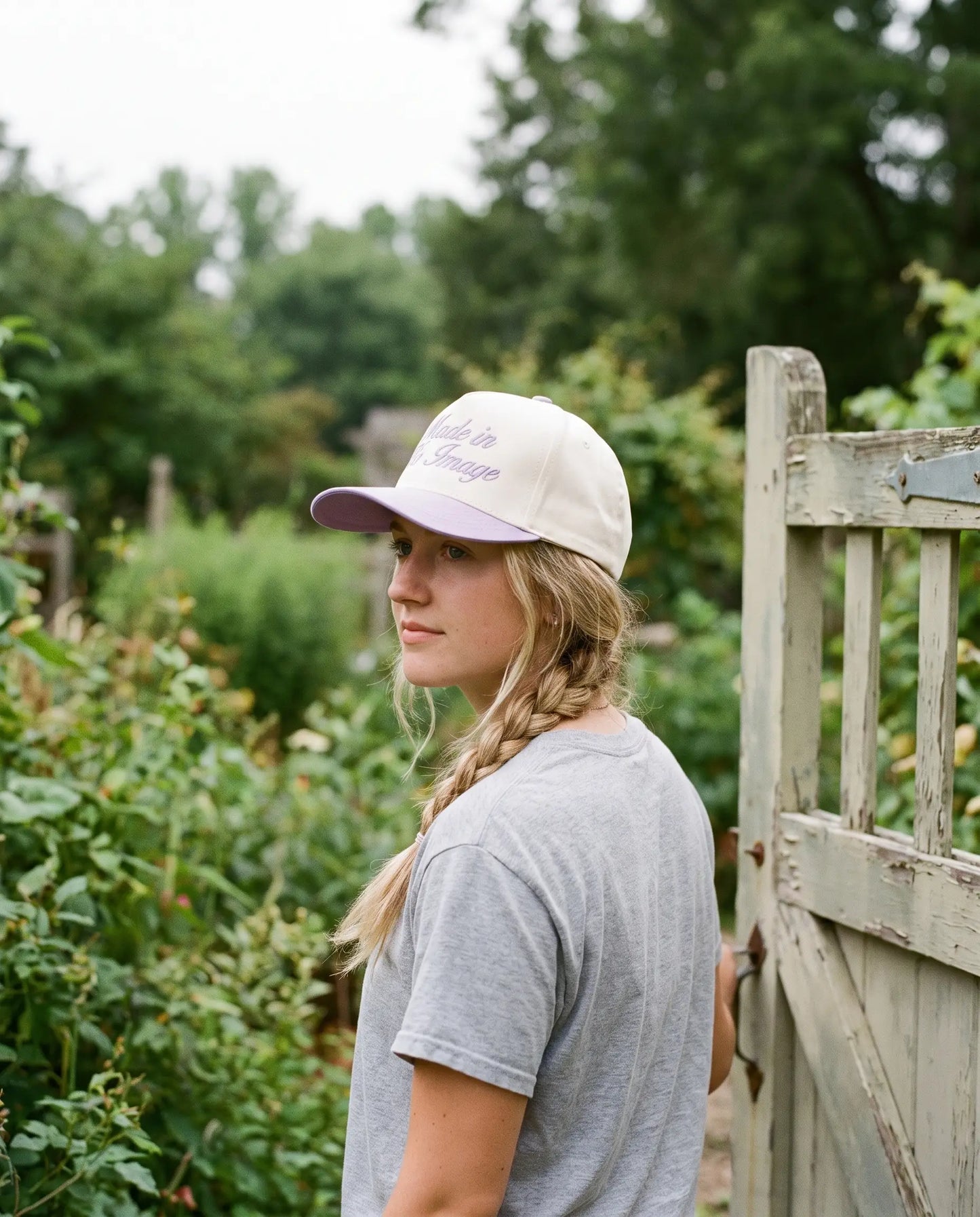 Model wearing the Made In His Image Hat, Lilac