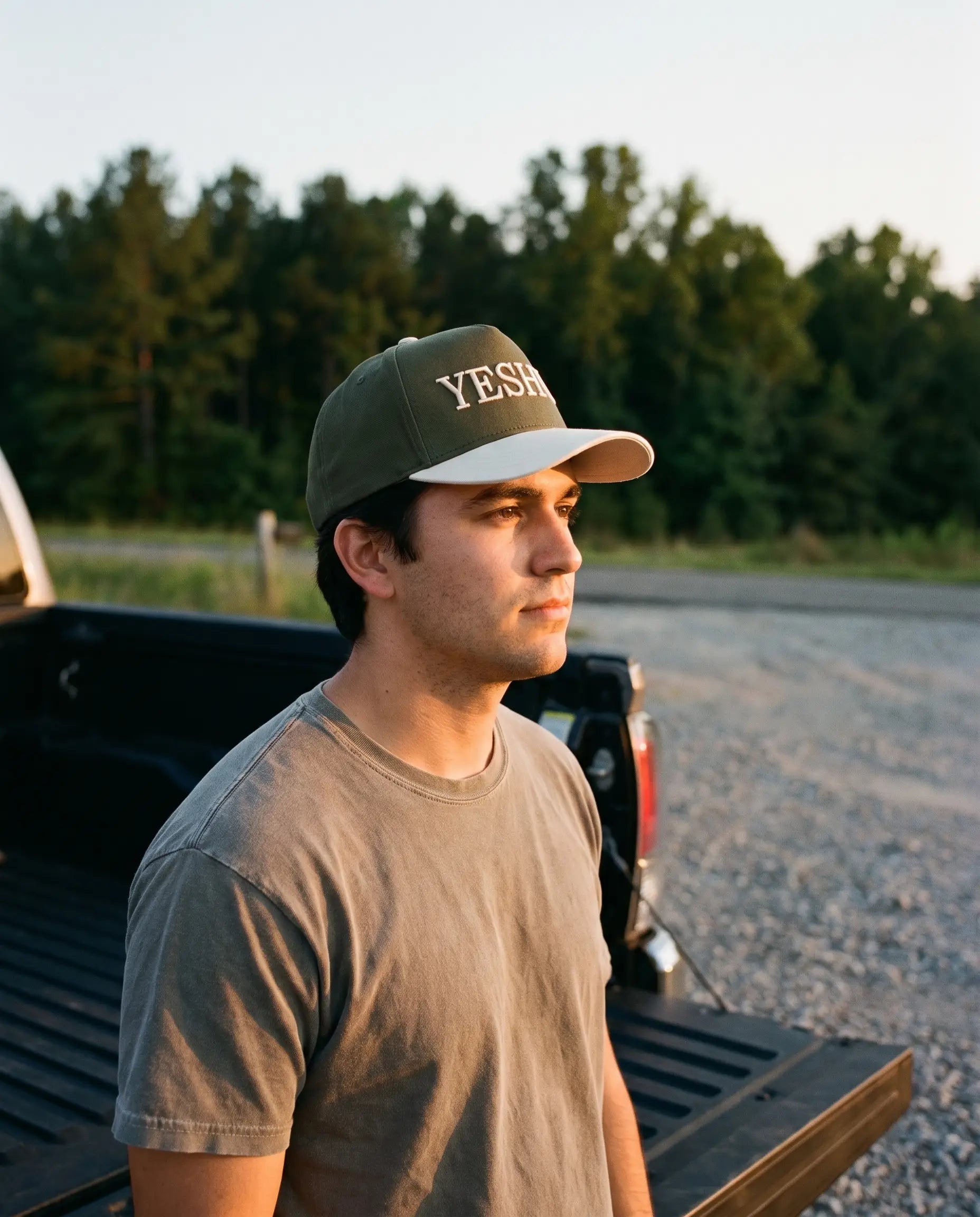 Model wearing the Yeshua Hat, Olive