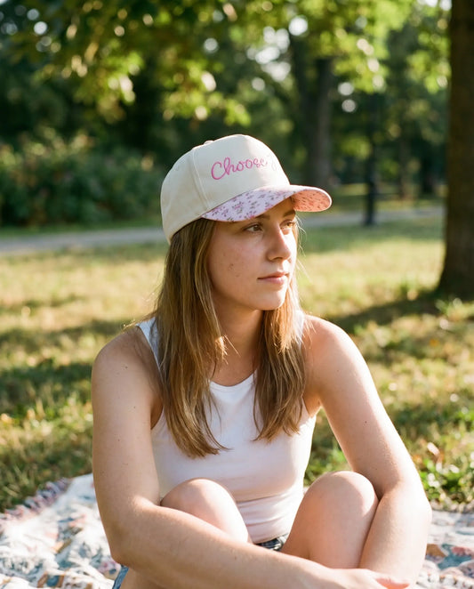 Model wearing the Choose Joy Hat, Floral Brim